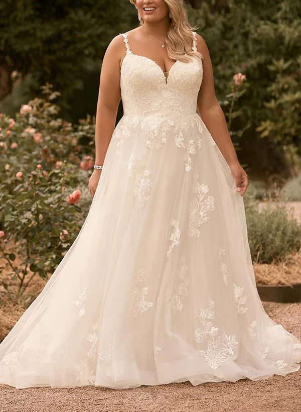 Elegant plus size A-line wedding dress with spaghetti straps, V-neck, and intricate lace appliques.