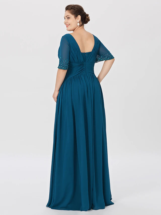 Chiffon floor-length dress with pleats and beading, back view.