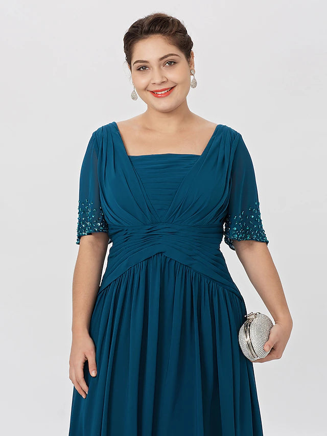 Detail of square neckline and short sleeve on formal gown.