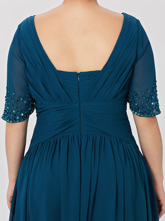 Model wearing a sophisticated plus size A-line gown for special occasions.