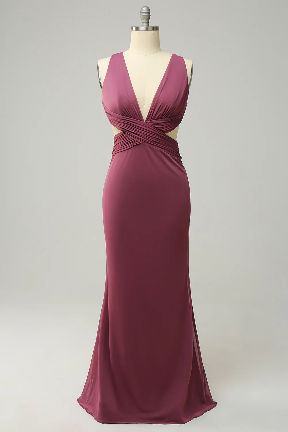 Model wearing an elegant plus size cross front long prom dress.