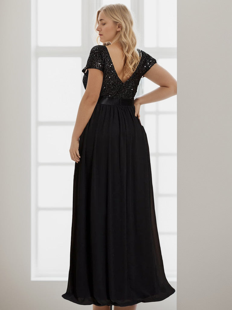 Black Plus Size Empire Waist V-Neck Cap Sleeve Chiffon Formal Gown, back view.