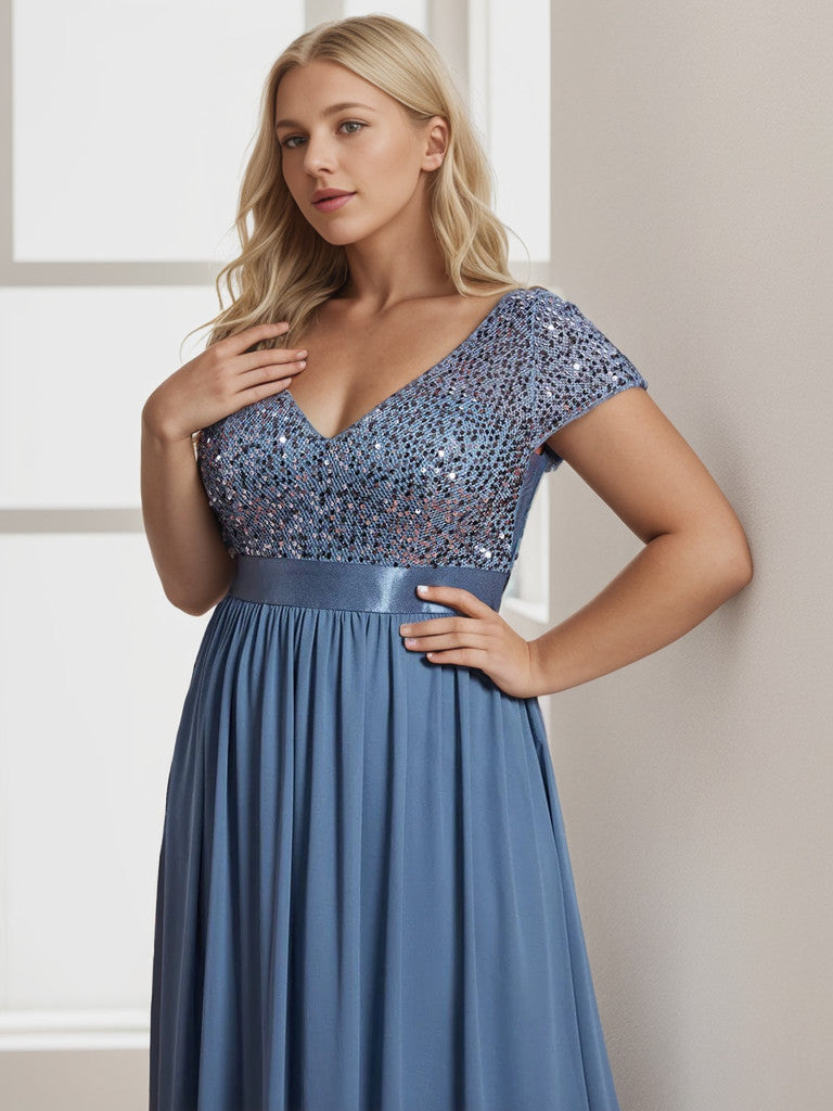 Dusty Navy Plus Size Empire Waist V-Neck Cap Sleeve Chiffon Formal Gown, side view.
