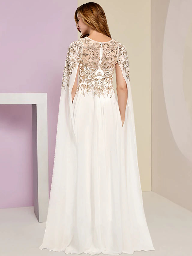 Close-up of the sequined lace and chiffon fabric on a plus size formal dress.
