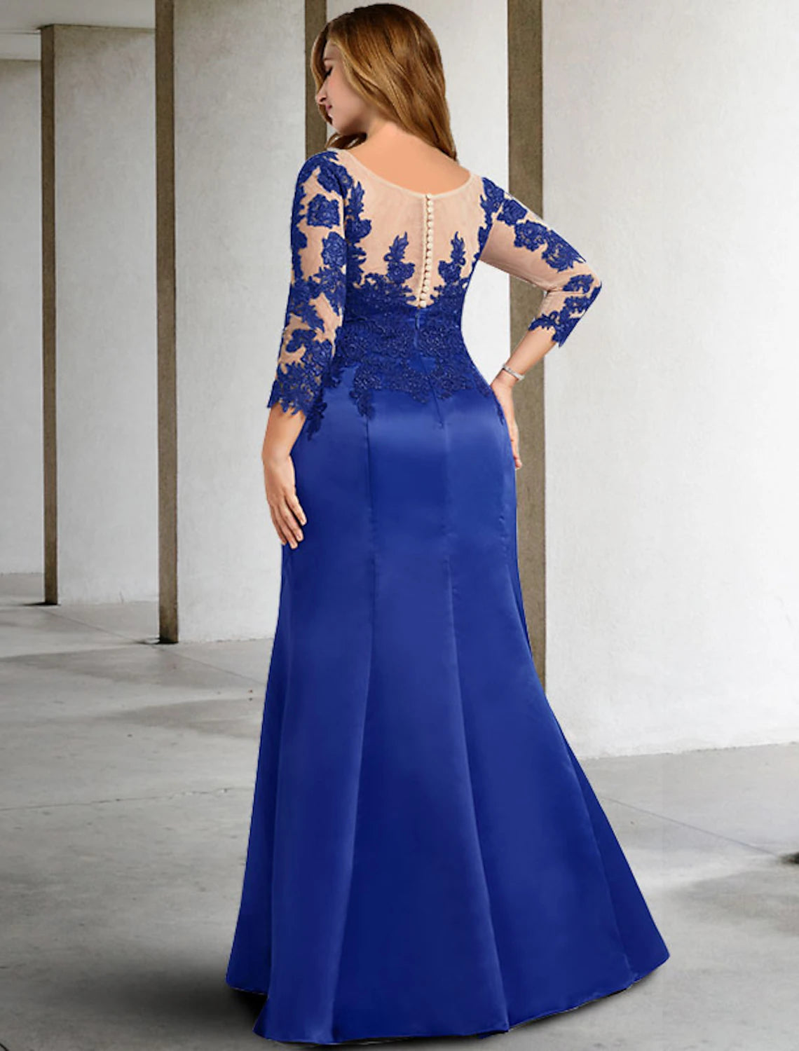 Back view of the elegant plus size mermaid Mother of the Bride dress, showcasing the floor-length design.