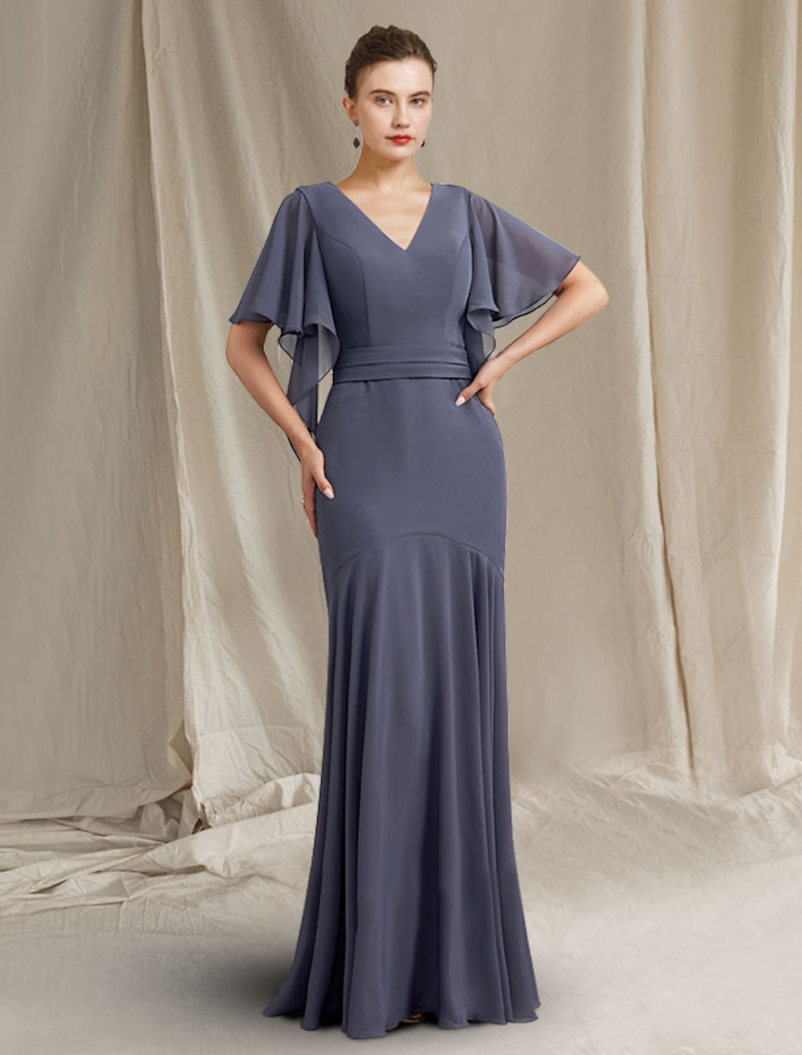 Elegant plus size Mother of the Bride dress in mermaid silhouette with V-neck and short sleeves.