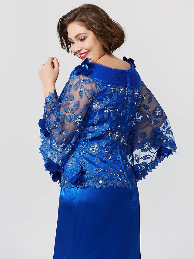 Full length view of the elegant plus size Mother of the Bride dress with pleats and ruffles.