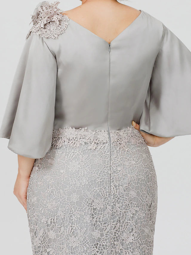 Back view of the formal dress with lace appliques and sweep train.