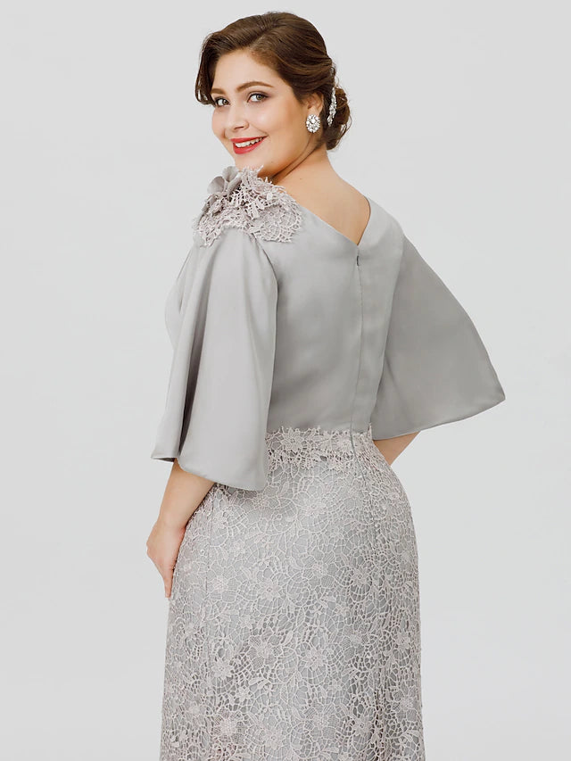 Intricate lace appliques on the elegant Mother of the Bride dress.