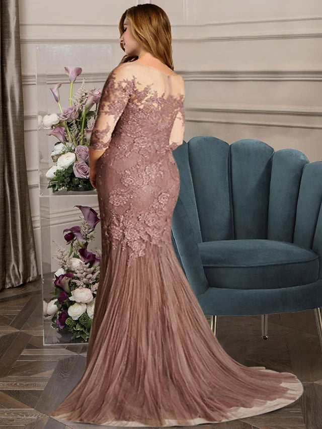 Close-up of the jewel neck and lace appliques on the elegant plus size formal gown.