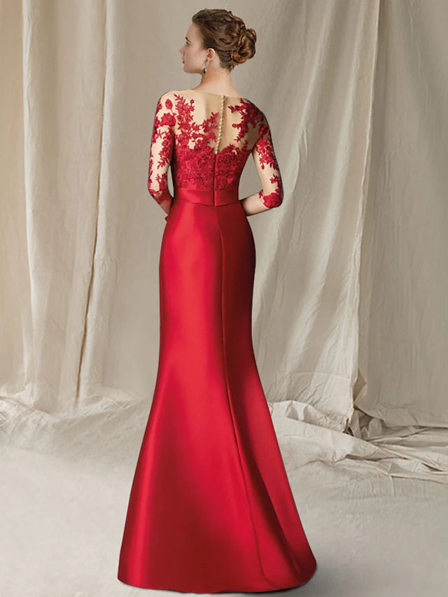 Close-up of the jewel neck and half sleeve details on the elegant formal dress.
