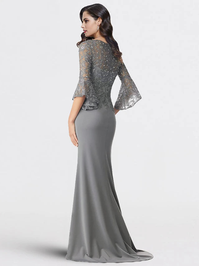Side view of plus size Mother of the Bride dress, showing V-neck, 3/4 sleeves, and lace details.