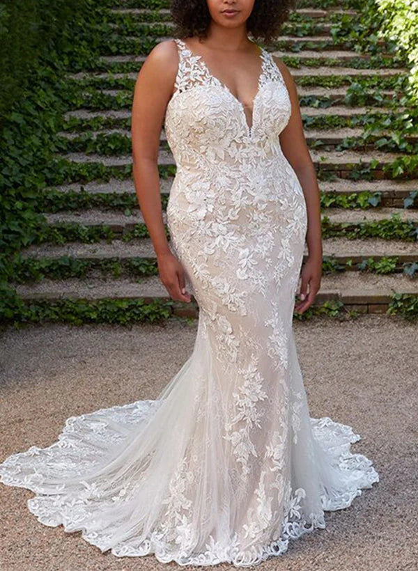 Elegant plus size mermaid wedding dress with V-neck and delicate lace appliques.