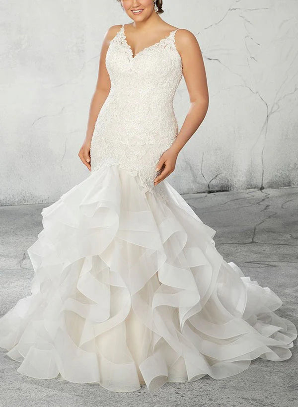 Elegant plus size mermaid wedding dress with V-neck and delicate lace appliques.