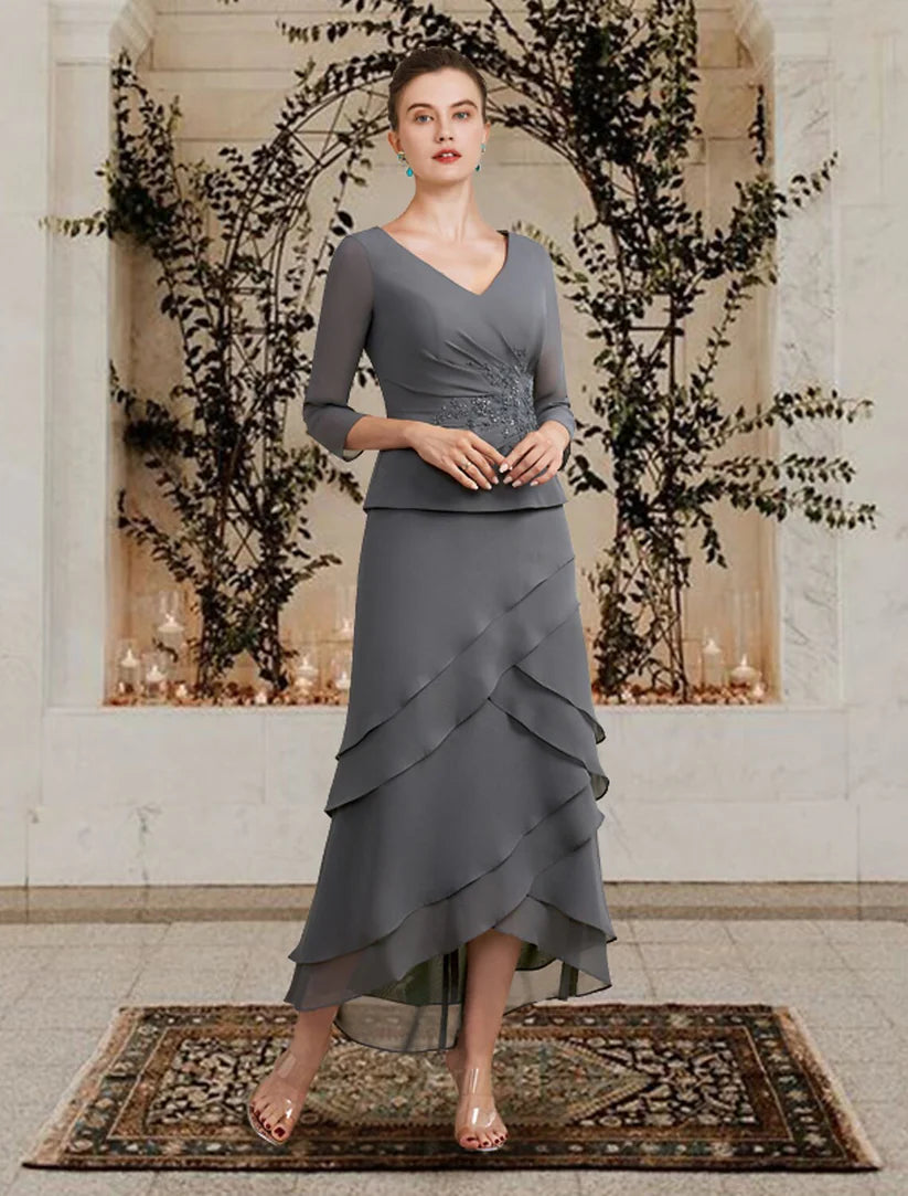 Elegant plus size A-line mother of the bride dress with high-low hem, V-neck, and 3/4 sleeves.