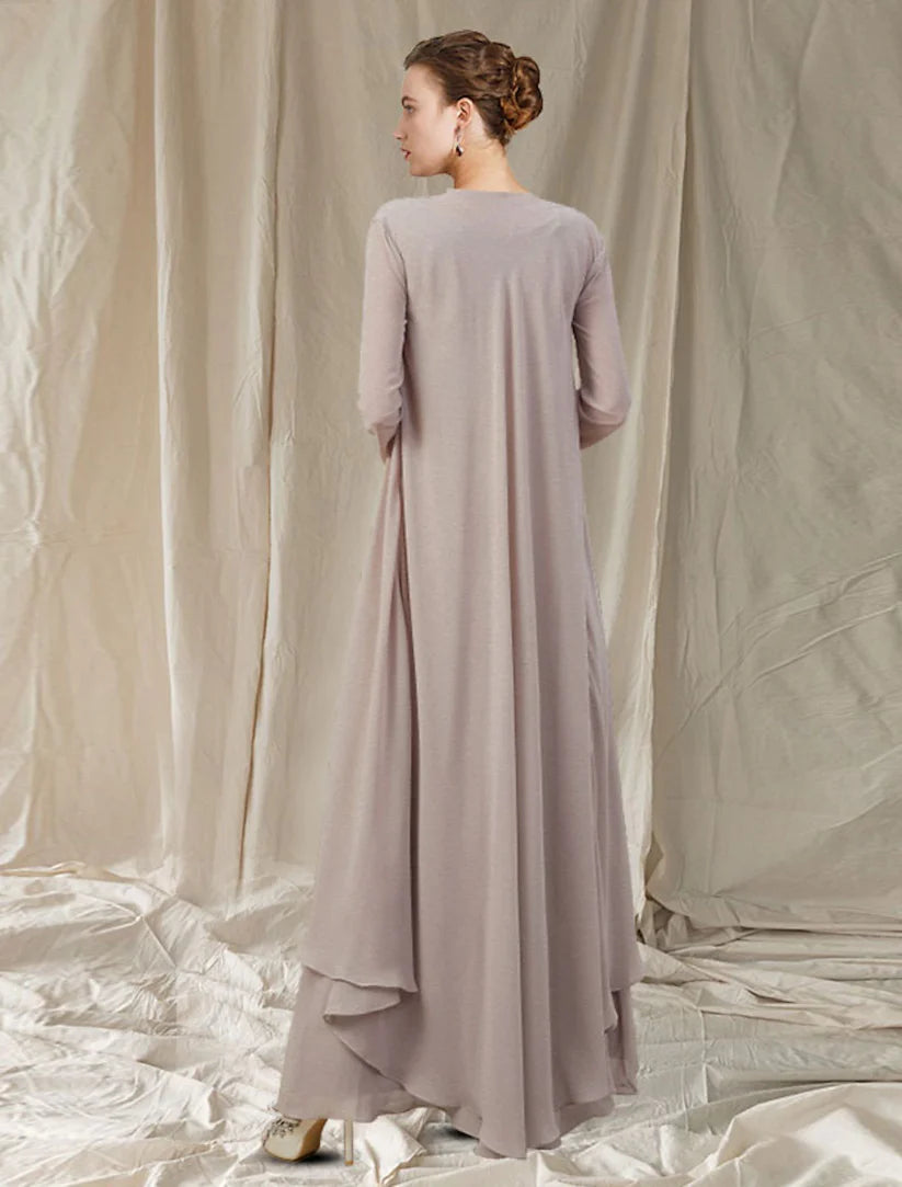 Full view of the two-piece chiffon mother of the bride gown, showcasing its flowing silhouette and jacket.