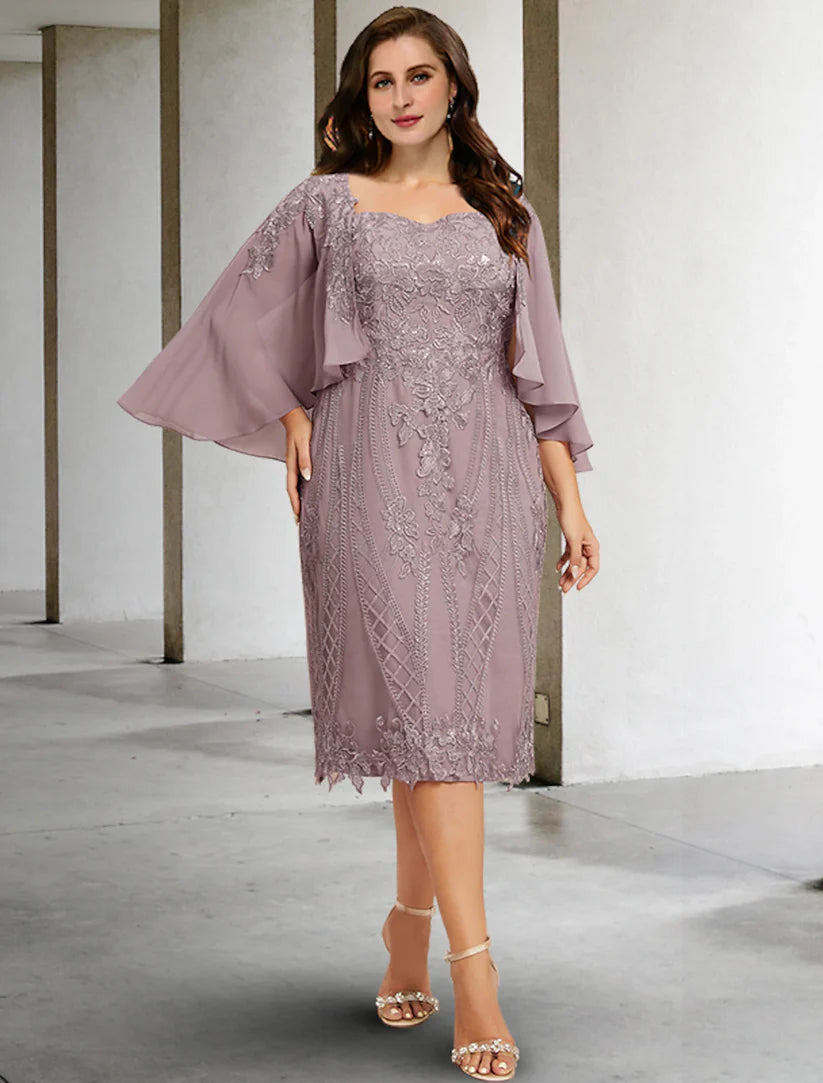 Woman wearing an elegant plus size tea-length Mother of the Bride sheath dress with a square neck, beading, and appliques.