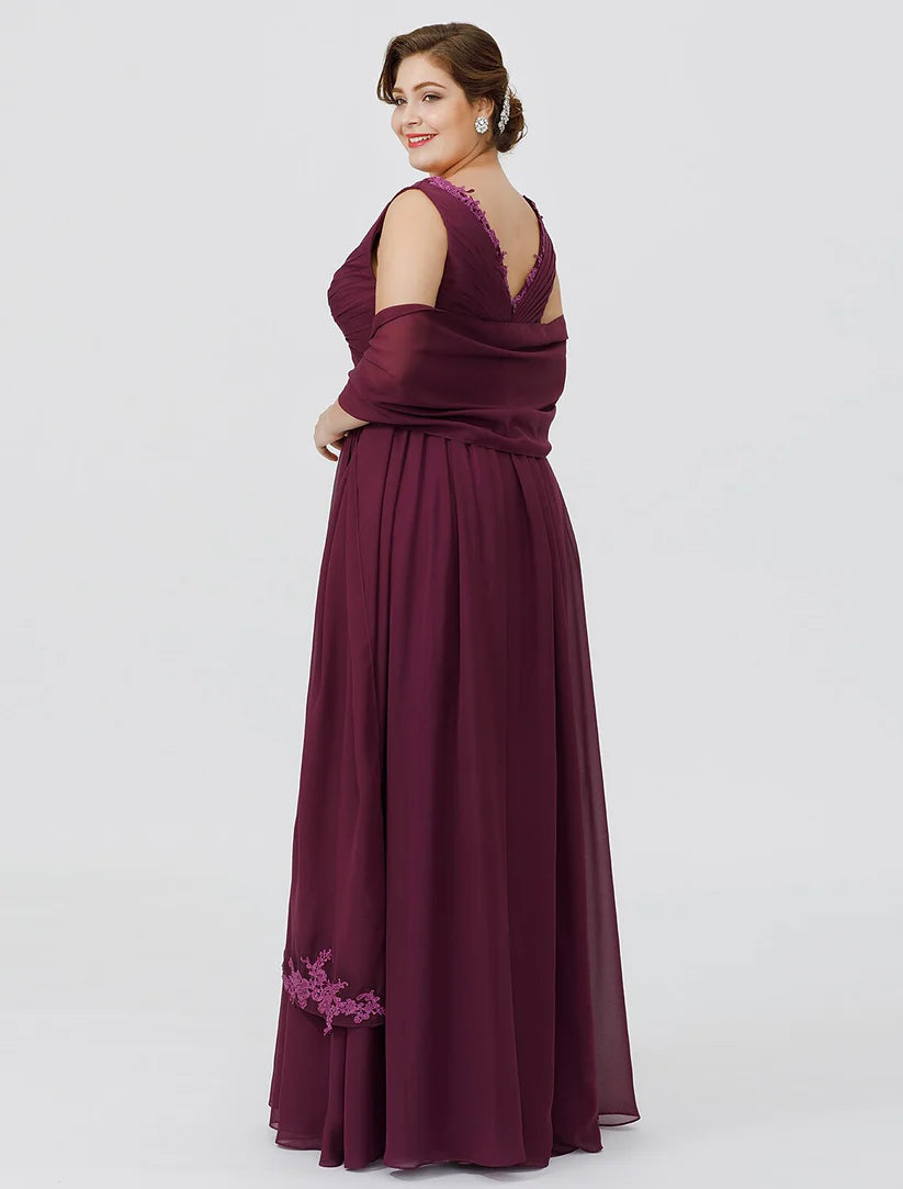 Side view of a woman in an elegant plus size V-neck chiffon sheath dress.