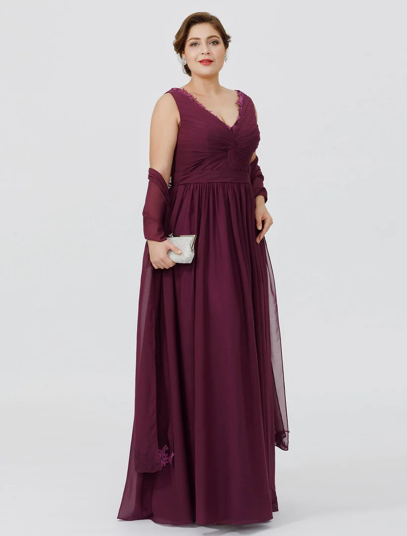 Back view of an elegant plus size V-neck chiffon sheath dress with criss-cross appliques.