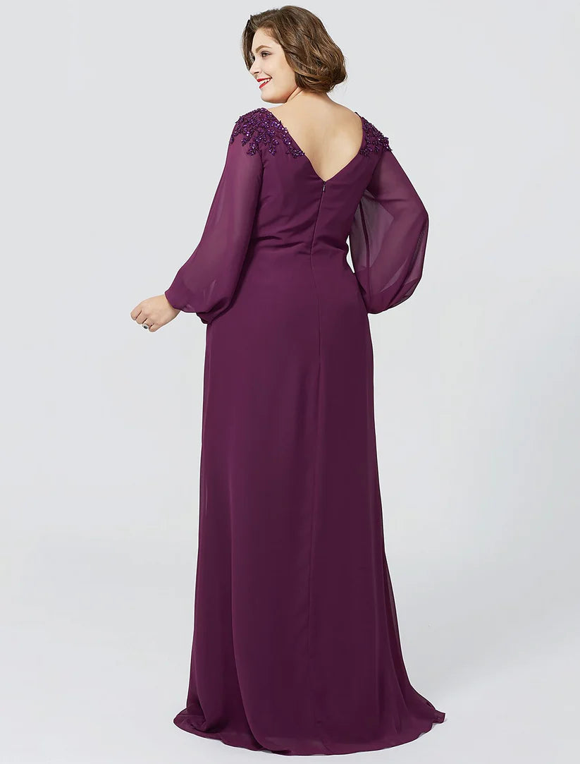 Formal floor-length gown featuring delicate beading and appliques.