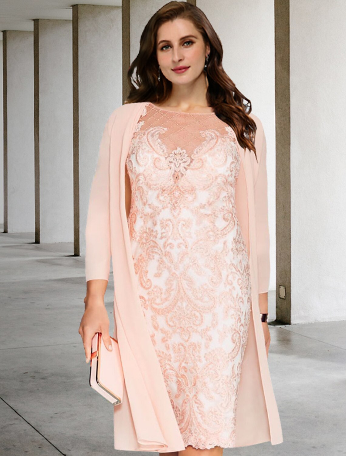 Elegant plus size Mother of the Bride sheath dress with jewel neck and half sleeves.