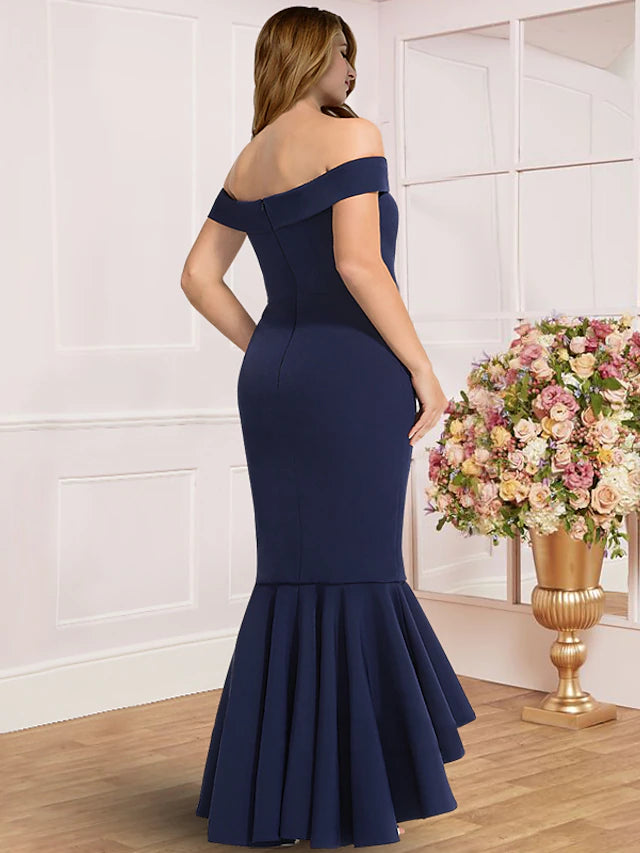 Back view of the plus size elegant off-shoulder pleated gown.