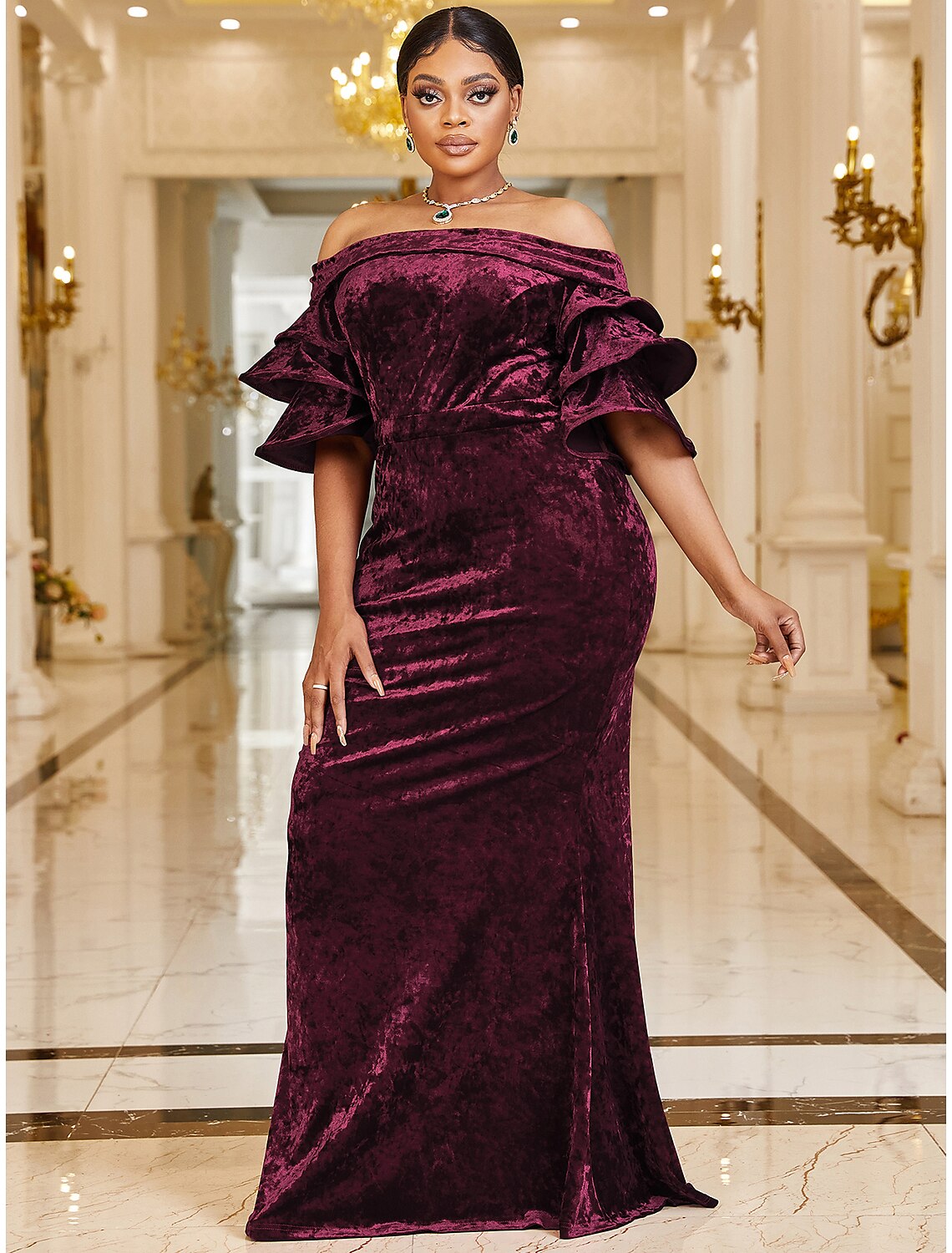 Plus size velvet mermaid dress with off-shoulder neckline and half sleeves.