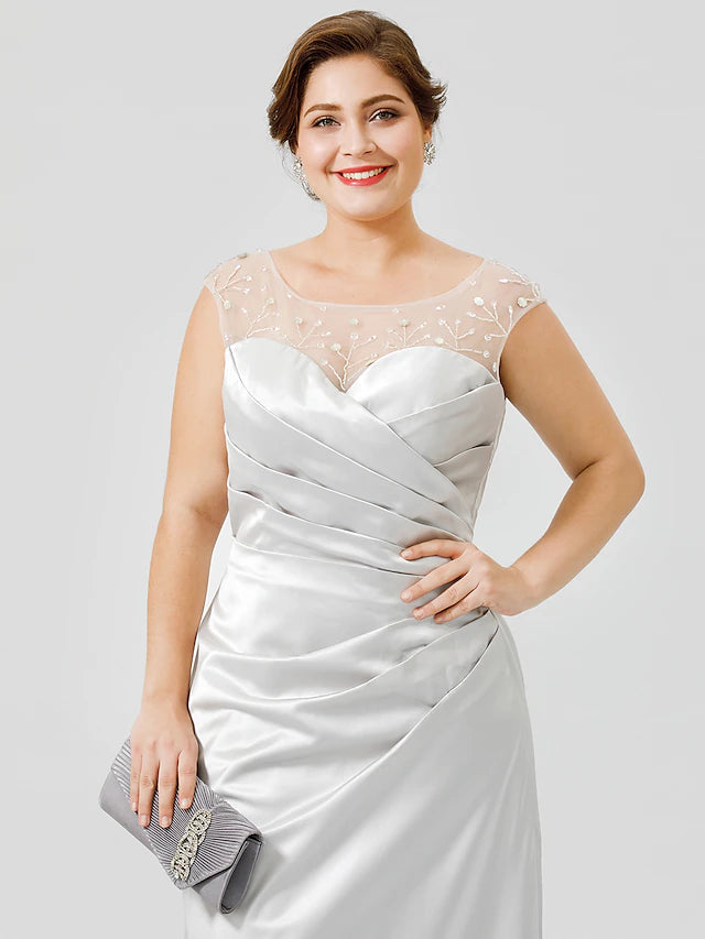 Back view of a jewel neck satin mother of the bride dress with subtle pleating.