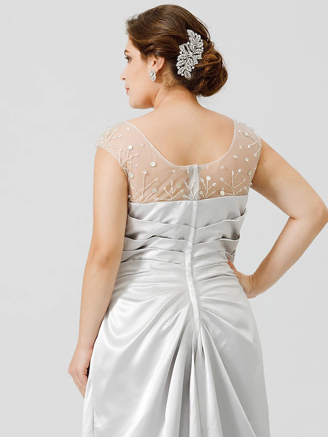 Full length view of a plus size satin sheath dress, ideal for formal events.