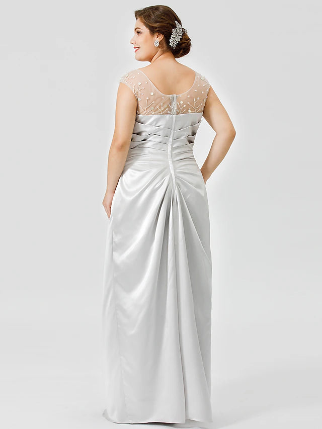 Front view of an elegant sleeveless satin dress with a jewel neckline.