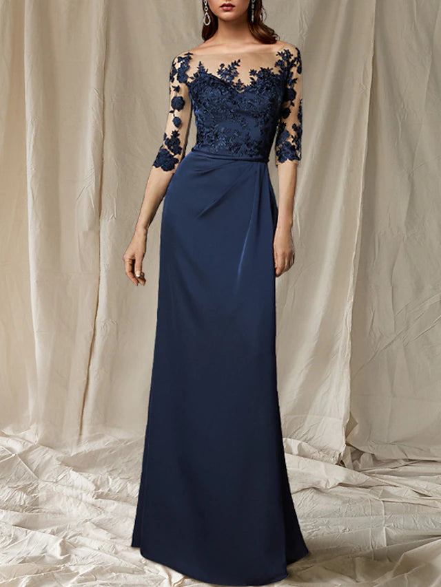 Back view of a plus size chiffon Mother of the Bride dress with sweep train.