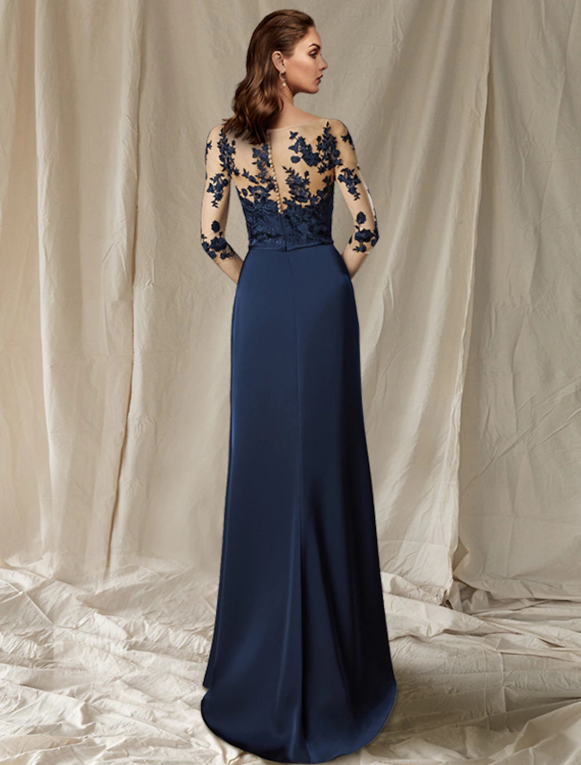 Side view of elegant plus size chiffon dress, showing half sleeves and sweep train.