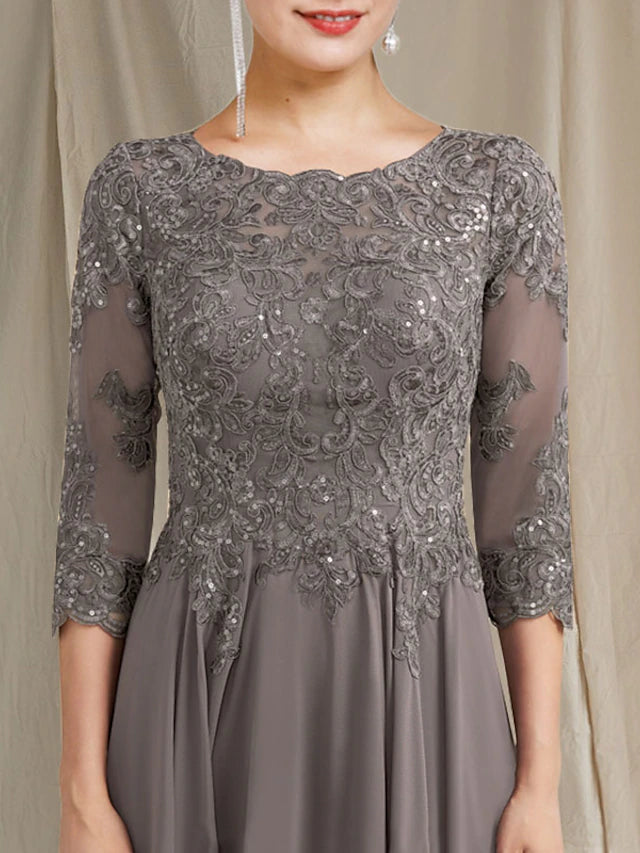Side view of floor length chiffon lace gown with delicate appliques.