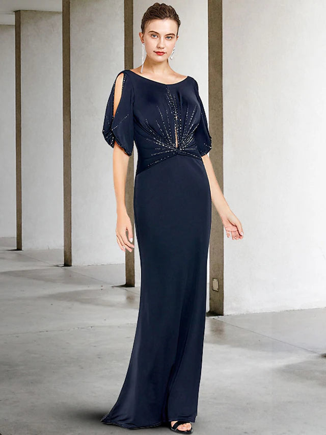 Elegant plus size Mother of the Bride sheath gown with jewel neck and short sleeves.