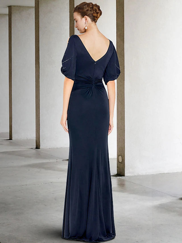 Side view of a plus size beaded chiffon Mother of the Bride dress.