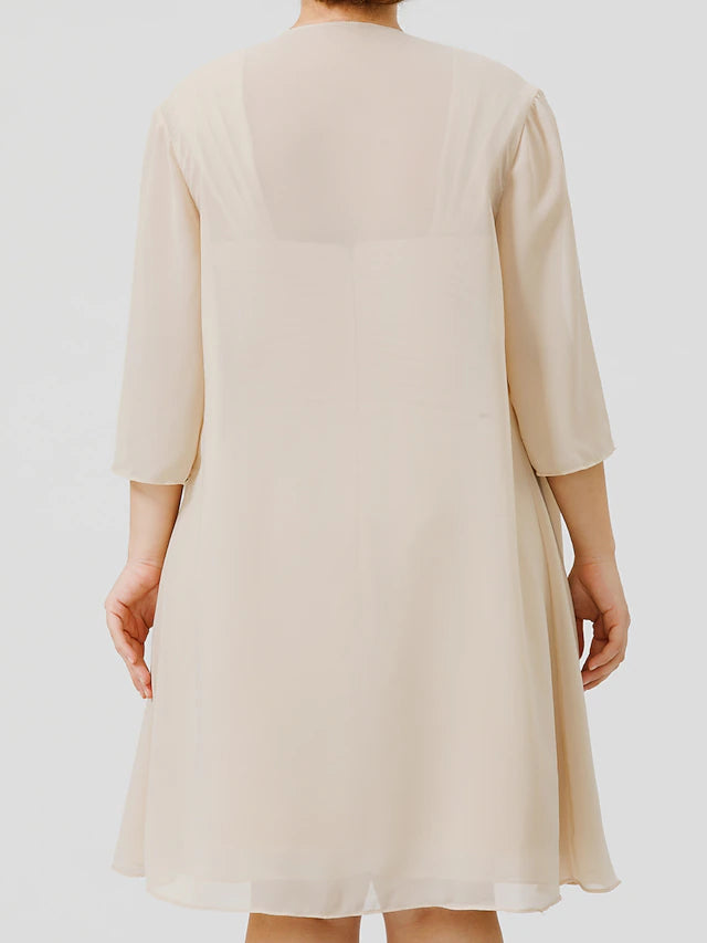 Model wearing the plus size mother of the bride dress, demonstrating its flattering fit.