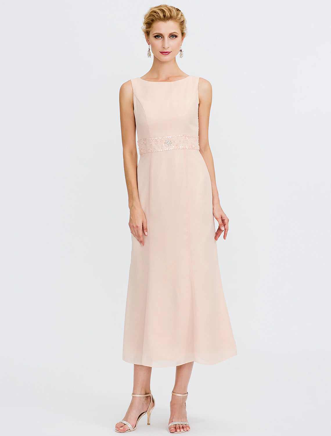 Model wearing the elegant two-piece dress, showcasing chiffon fabric.