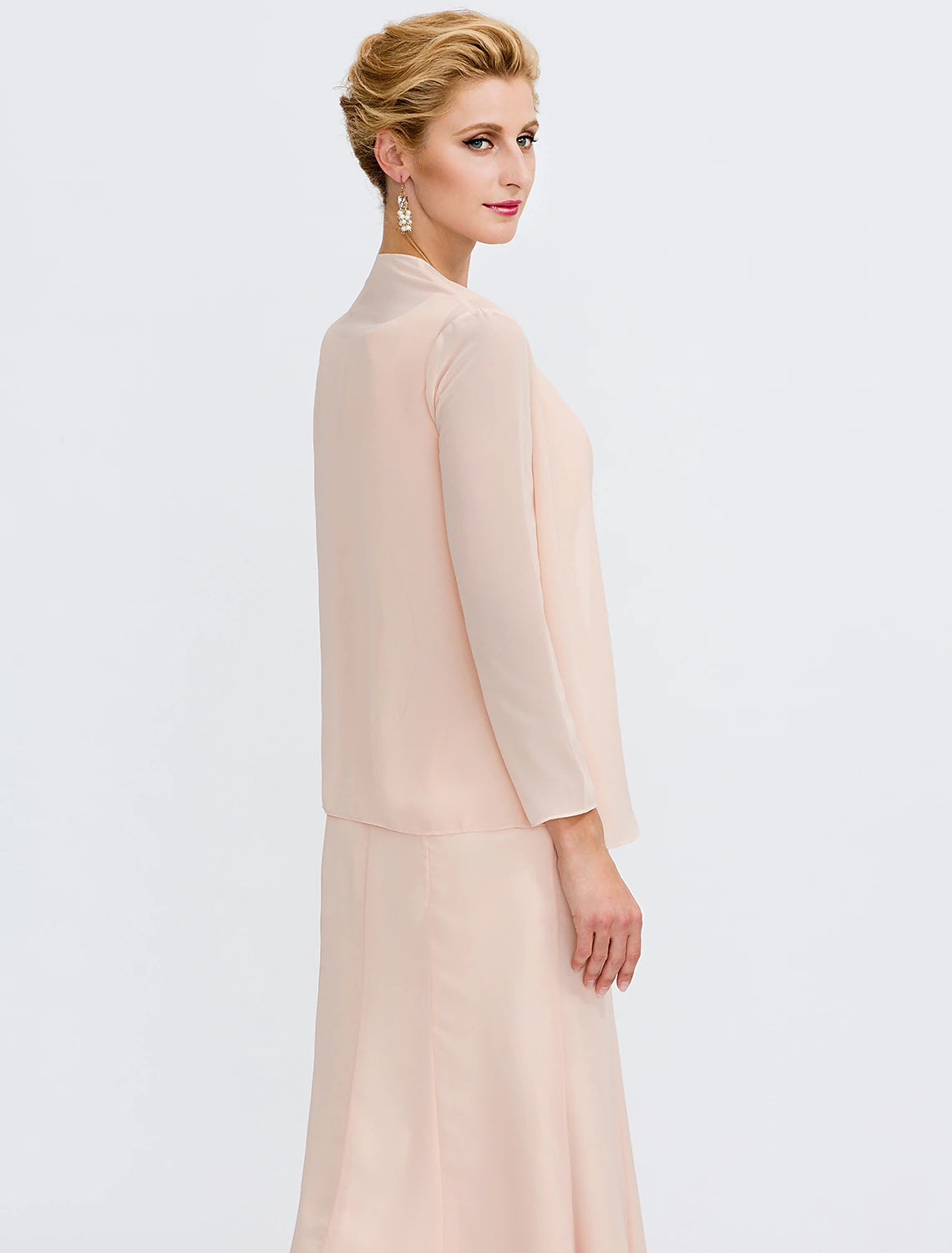 Another angle of the elegant long sleeve sheath dress.