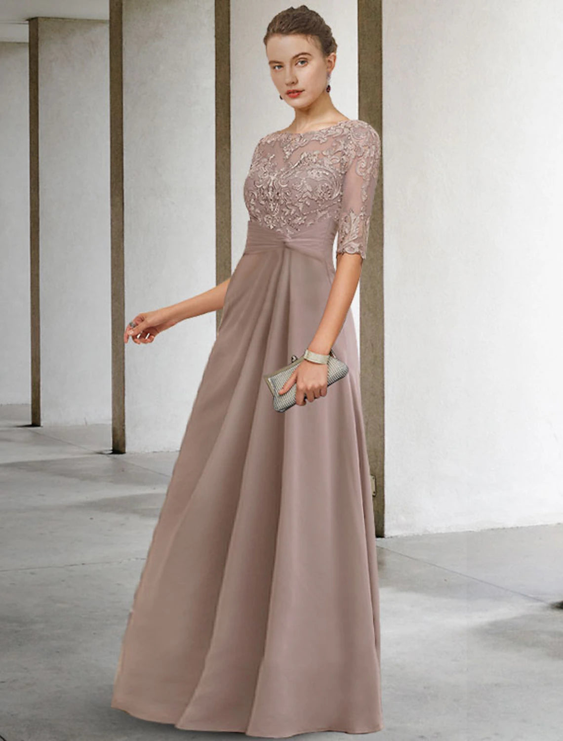 Full length view of the elegant sheath dress with appliques and side draping.