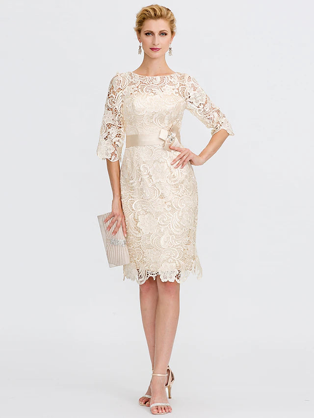 Elegant plus size sheath dress with illusion neckline and lace.