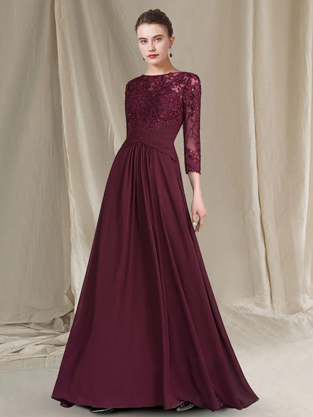 Back view of the floor length chiffon lace Mother of the Bride gown.