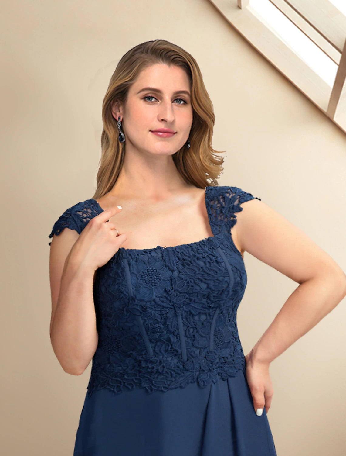Side view of the two-piece Mother of the Bride dress, highlighting the A-line silhouette.