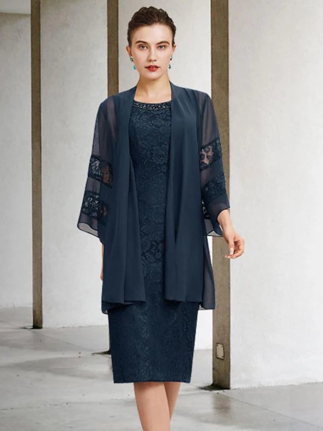 Back view of the two-piece sheath dress, showing knee-length skirt.
