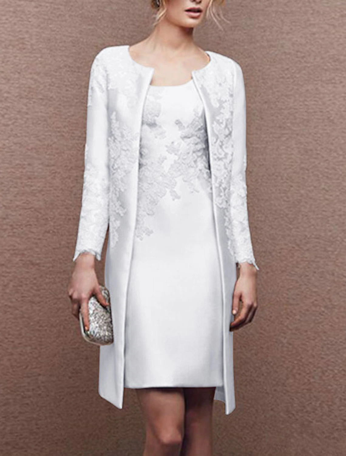Side view of the two-piece satin lace dress with delicate appliques.