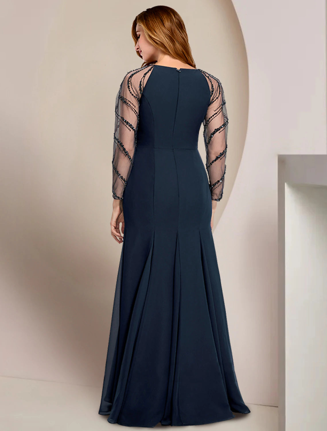 Side view of the plus size V-neck long sleeve chiffon dress with sequin embellishments.