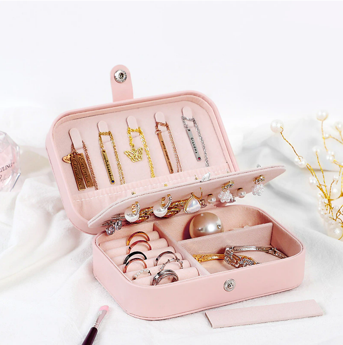 Elegant portable jewelry storage box, closed view.