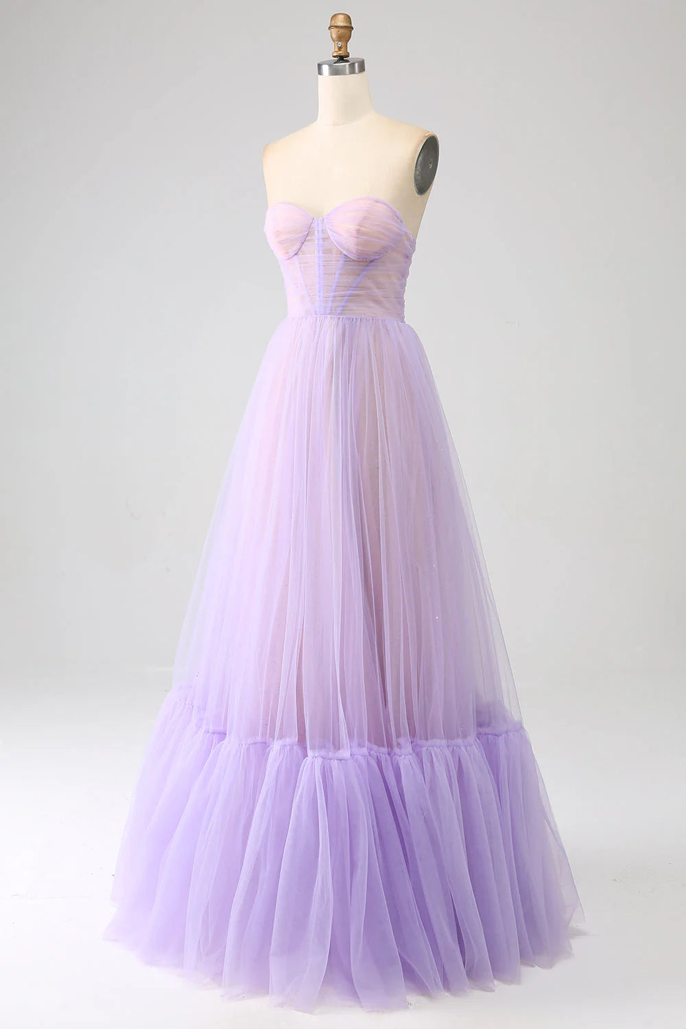 Back view of a lilac princess corset floor-length tulle prom dress.