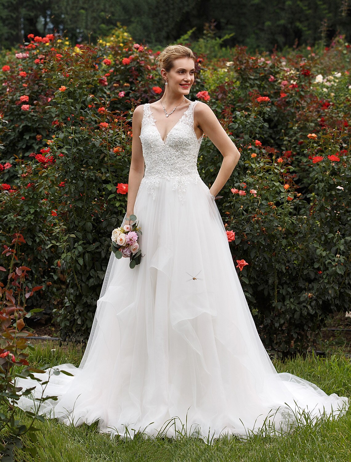 Elegant princess bridal dress with a long train.