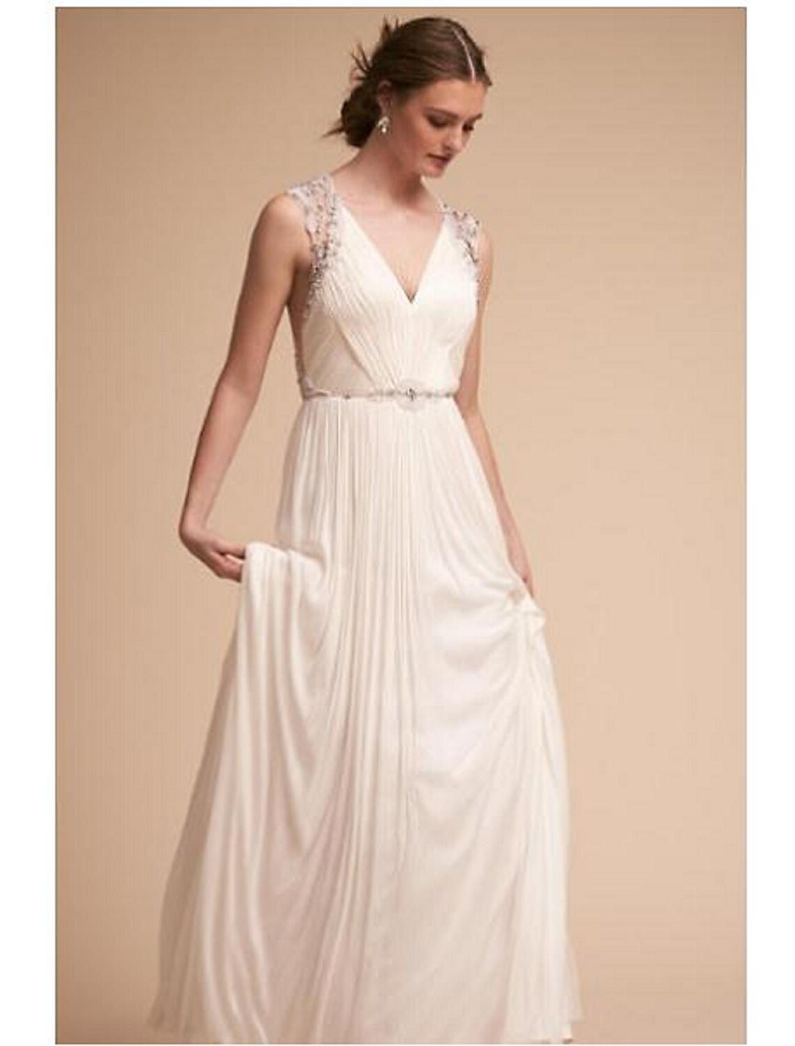Princess V-neck chiffon wedding dress with beading and appliques.
