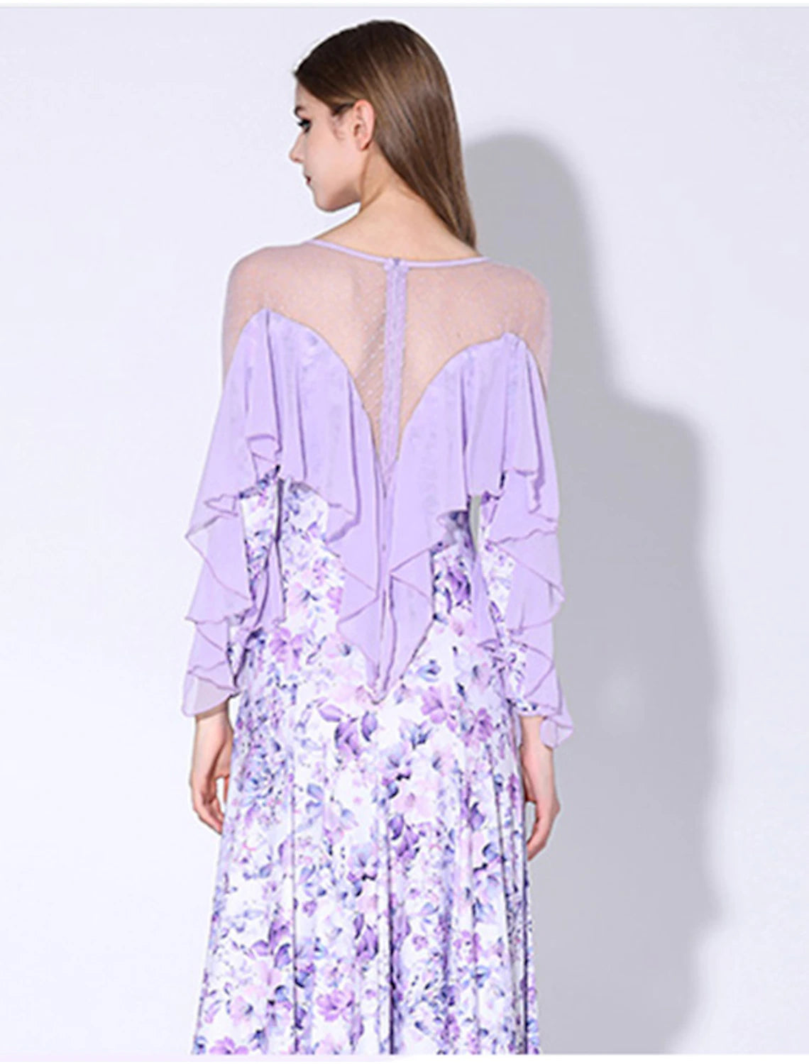 Long sleeve ruffled printed ballroom dance dress in motion.